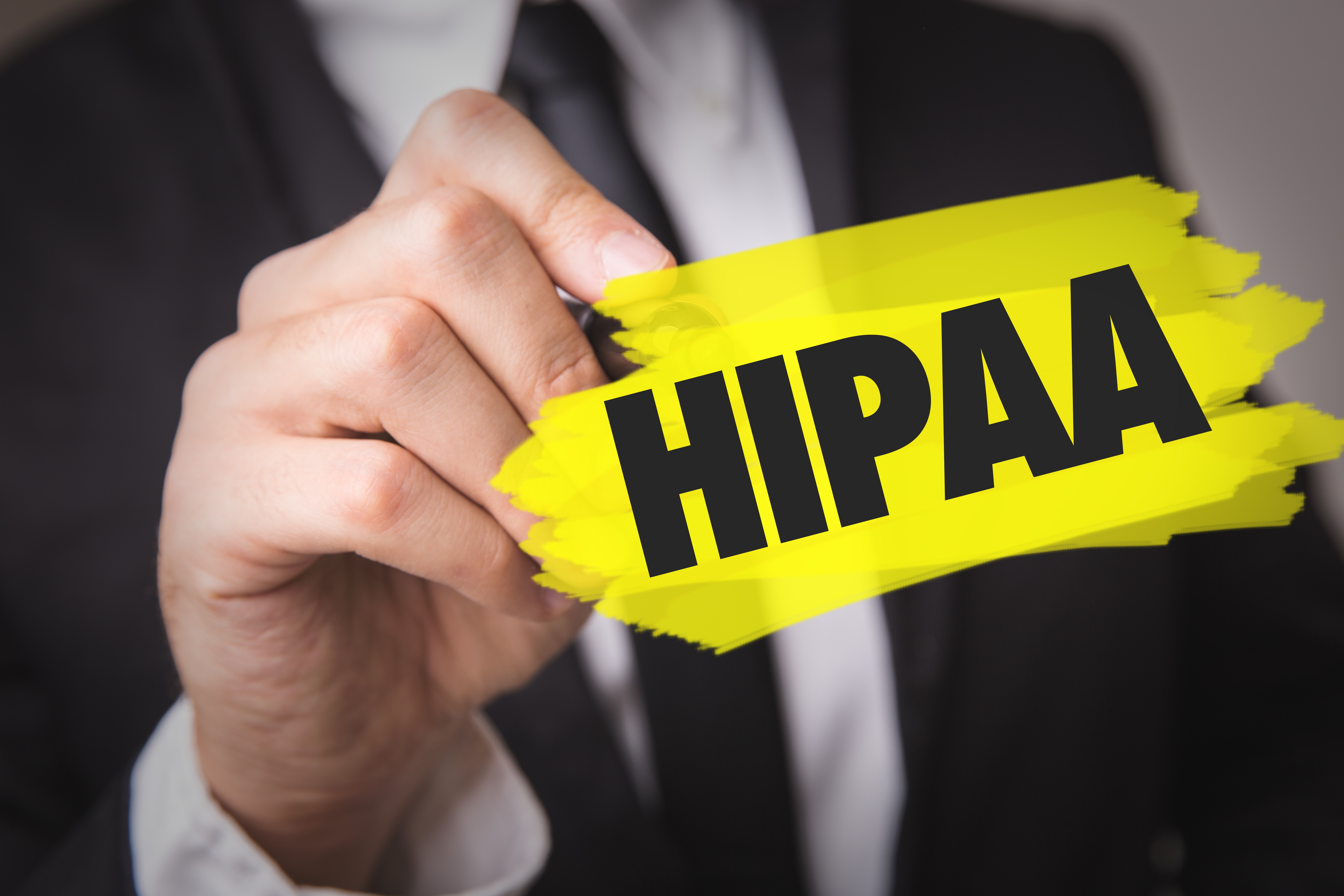 Man-highlighting-HIPAA.jpg