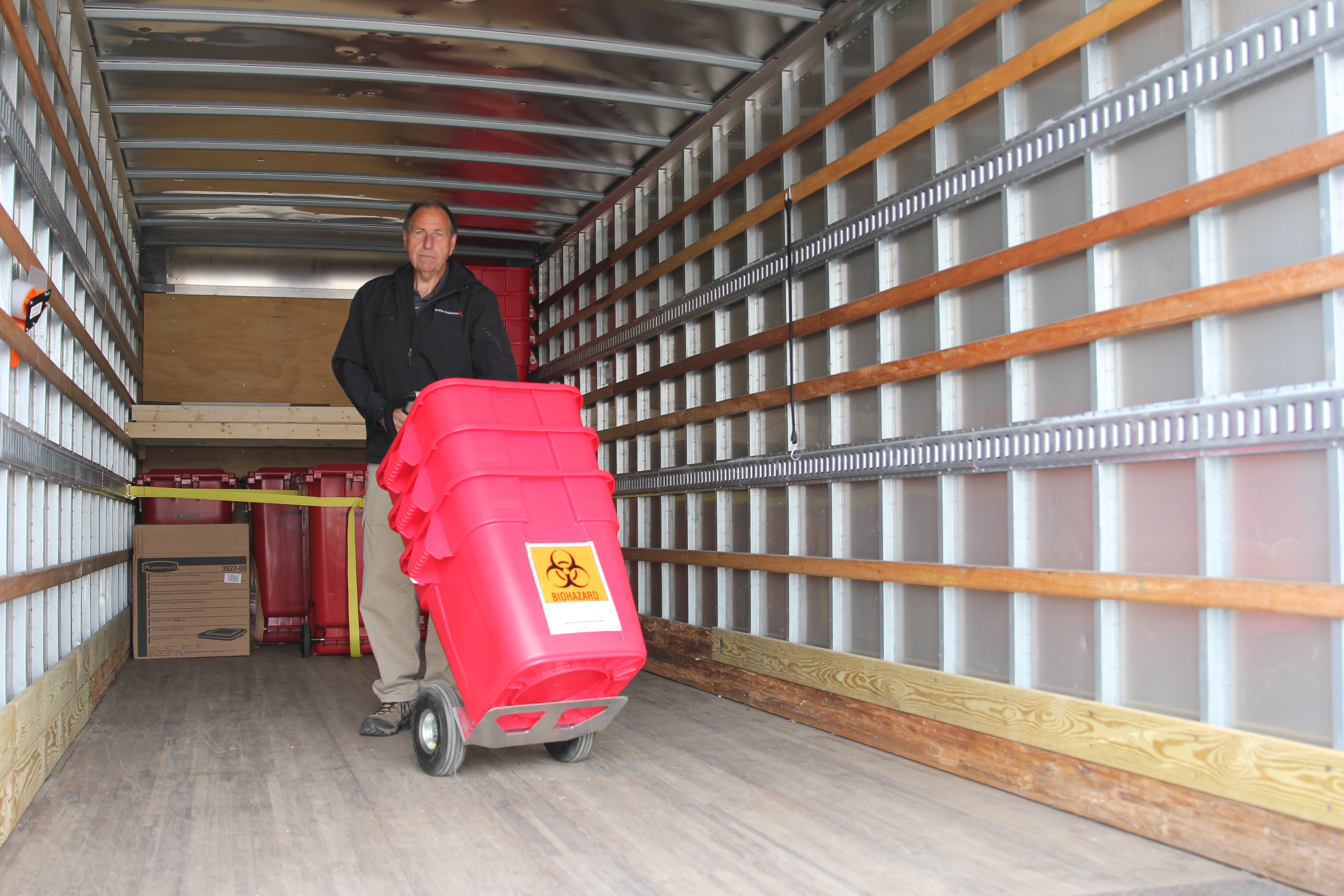 TriHaz-Employee-Transporting-Medical-Waste.jpg